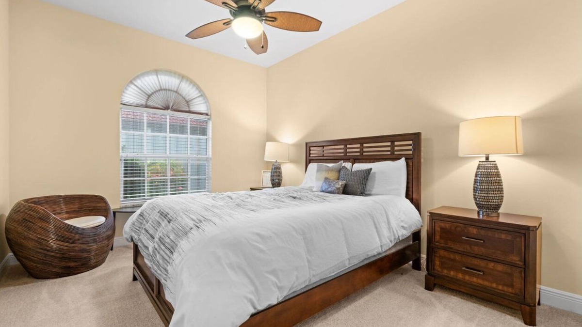 Waters Edge House | Charming 3-bedroom lake house in Fort Myers with screened-in pool & hot tub.
