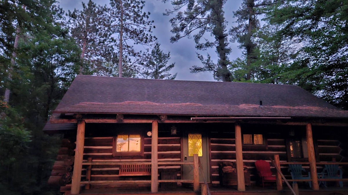 Wauksaukee Cabin | Charming 4+ bedroom log cabin among beautiful tall pines on a small trout stream