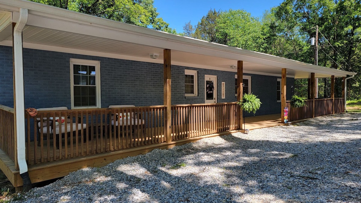 Chester House | Charming brick home set in the woods on 45 acres with pond and trails.