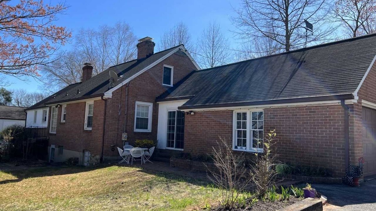Hollins House | Charming brick ranch with an acre of beautiful garden