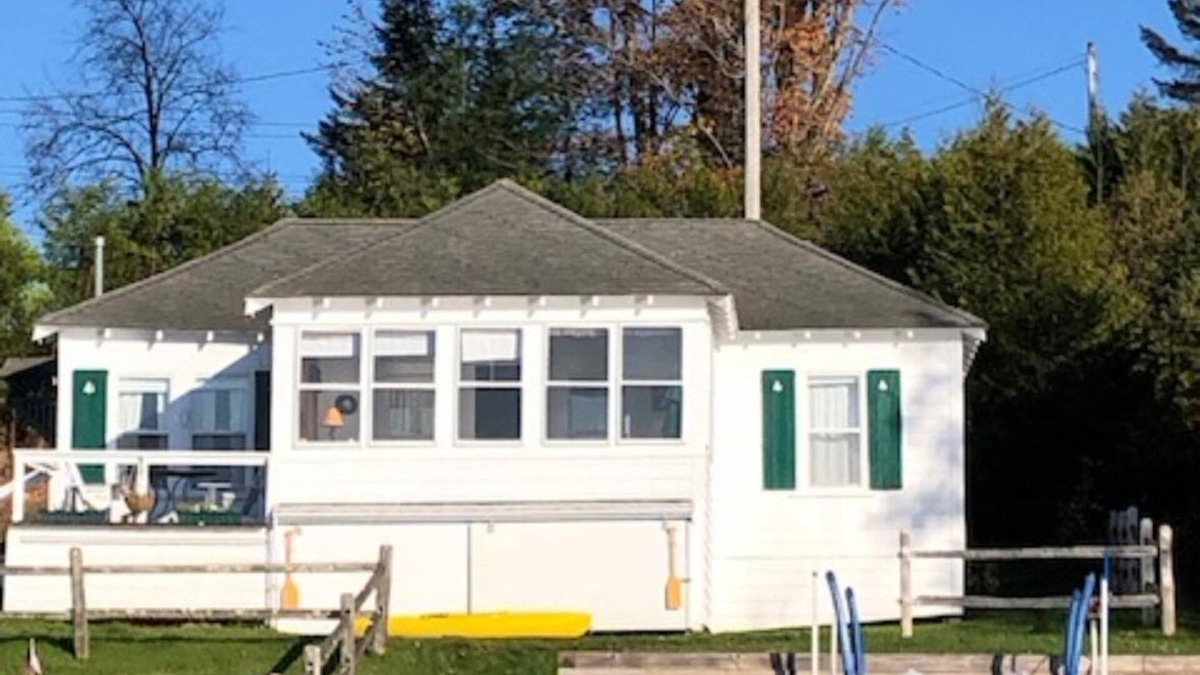Westmore Cabin | Charming cottage on Lake Willoughby w/sun porch, private deck and dock.