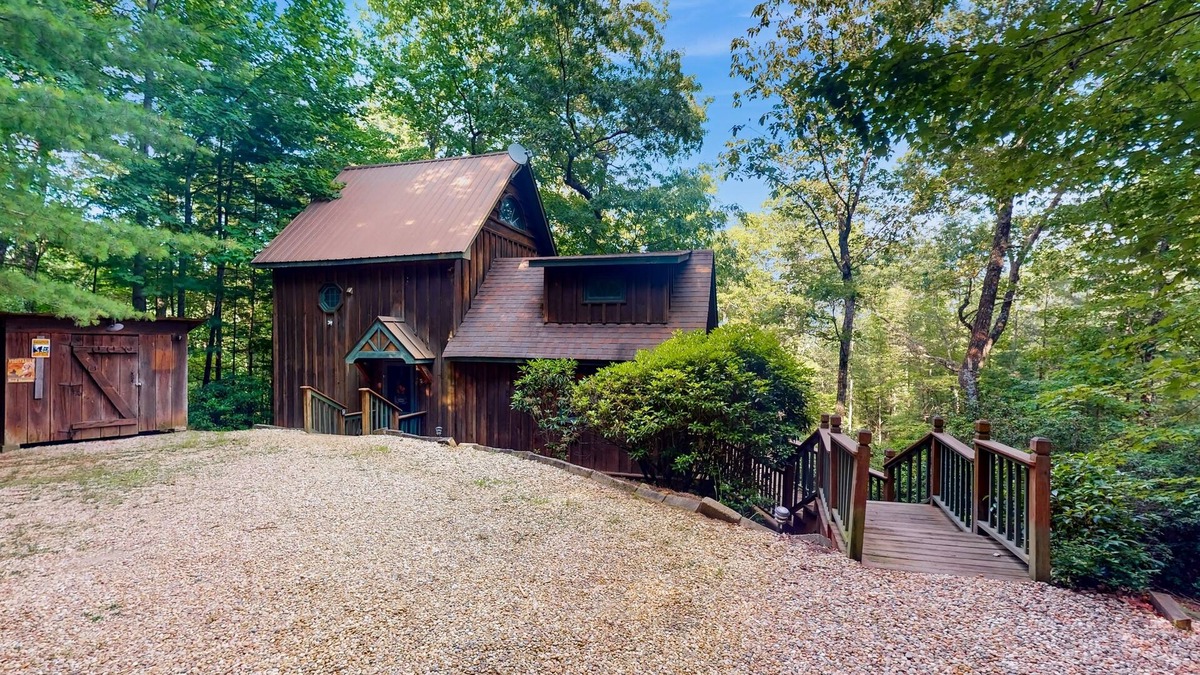Raccoon Ridge Cabin | Charming, dog-friendly cabin with a private hot tub, outdoor fireplace, & yard