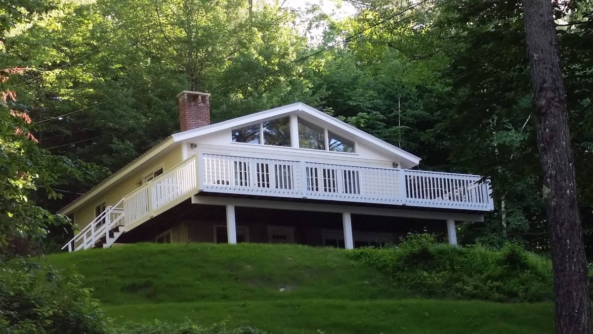 Elkins House | Charming home across from pristine Pleasant Lake, New London