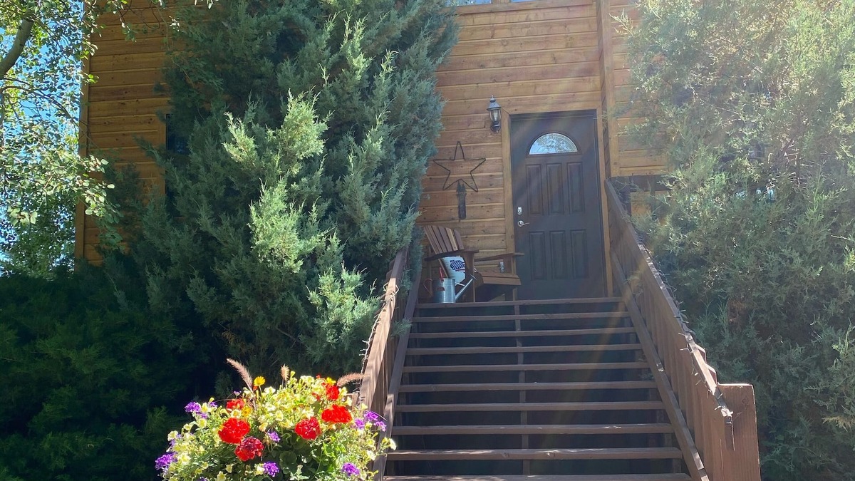 Driggs Cabin | Charming home on Ski Hill Road with lush landscaping and a new hot tub.