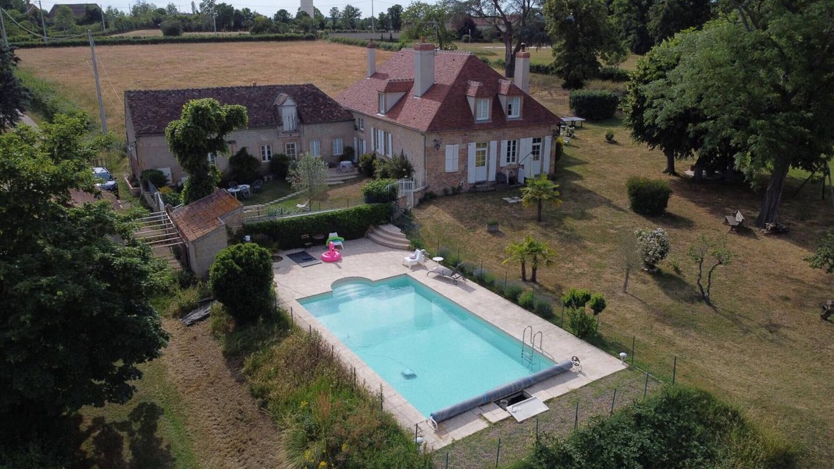 Neuvy Cottage | Charming House with Shared Pool, Views of Moulins, and Private Terrace