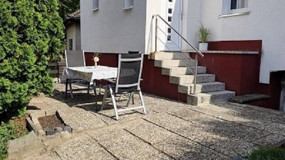 Hagen Apartment | Charming house within a house - vacation & business apartment with private terrace.