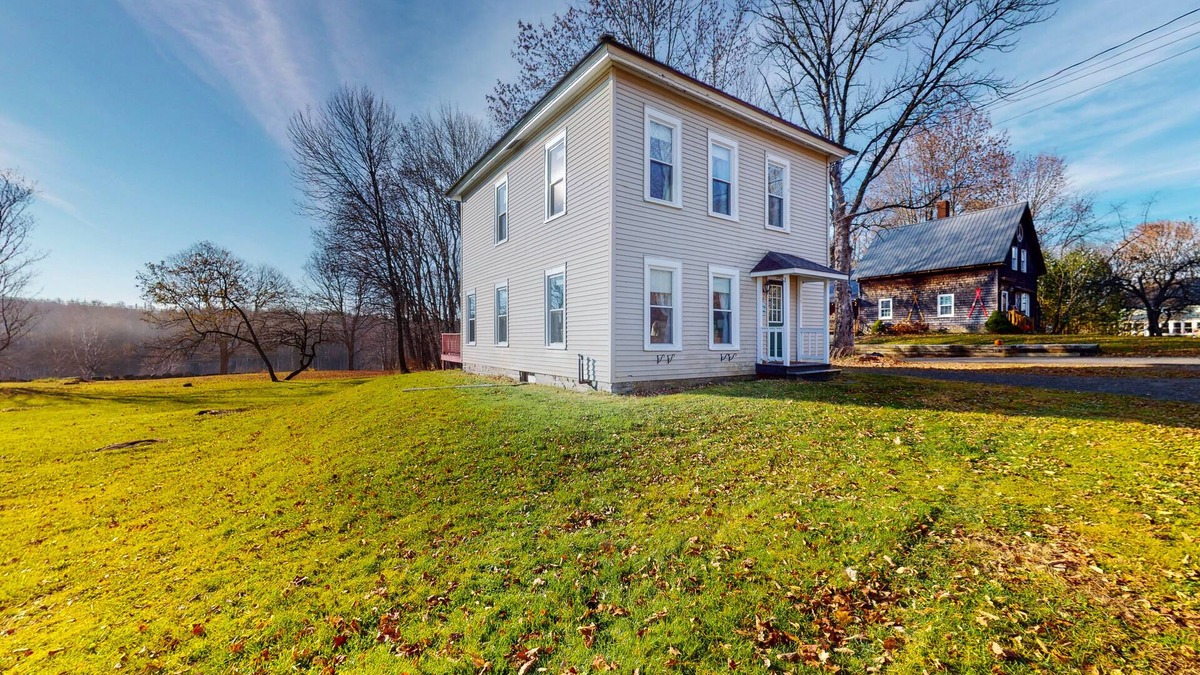 Monson House | Charming, lakefront dog-friendly home with a firepit, dock, & fast WiFi