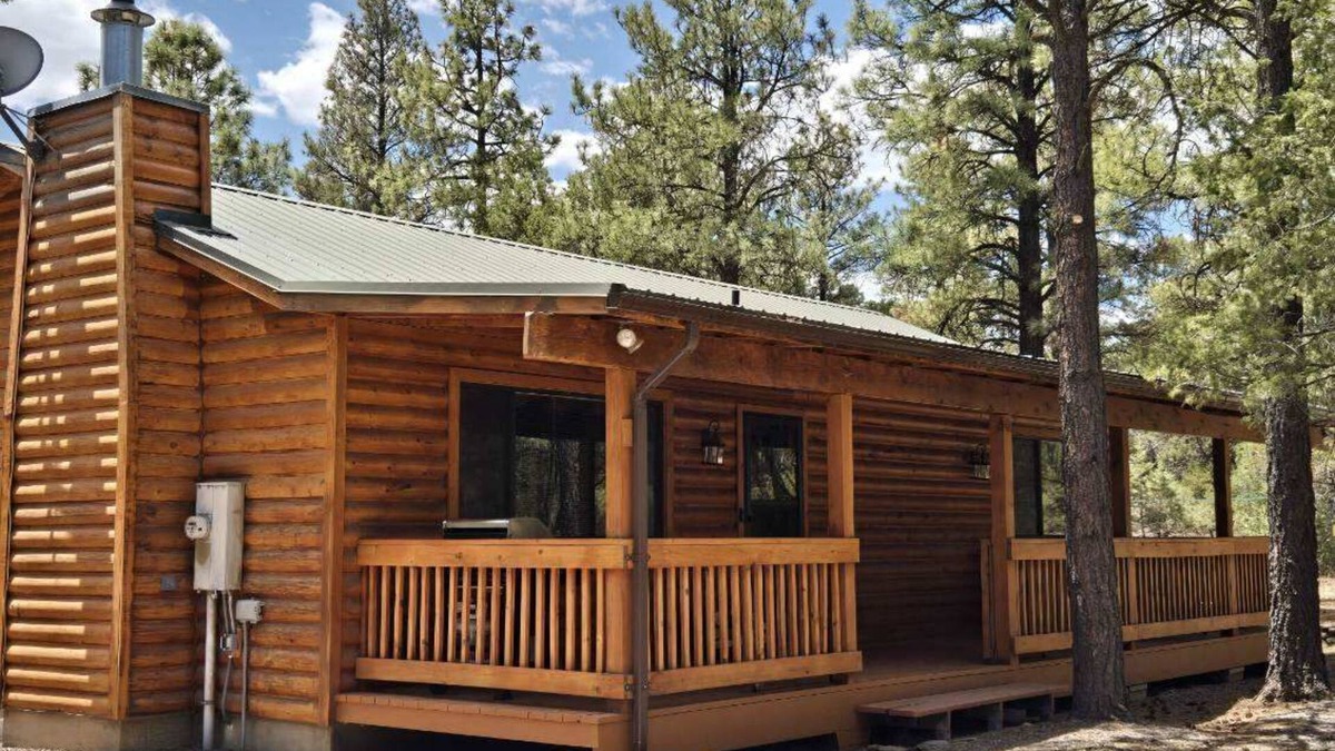 Eagar Cabin | Charming remodeled family cabin room for 8 nestled in the woods & near lakes