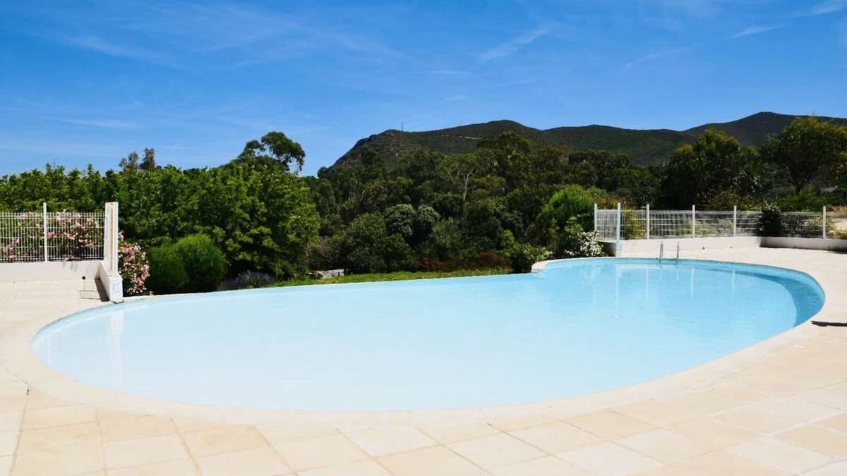 Lozari Apartment | Charming residence with waterfront pool.