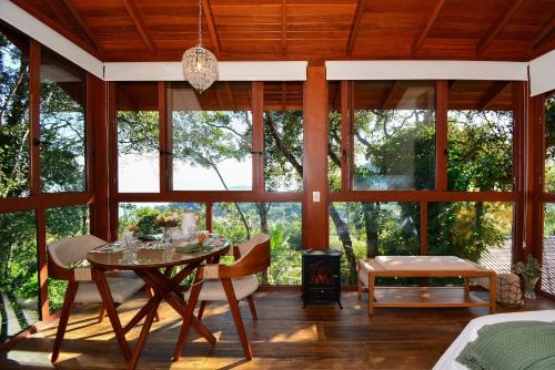 Sambaqui Apartment | Charmosa Suíte em Sambaqui - NDI005