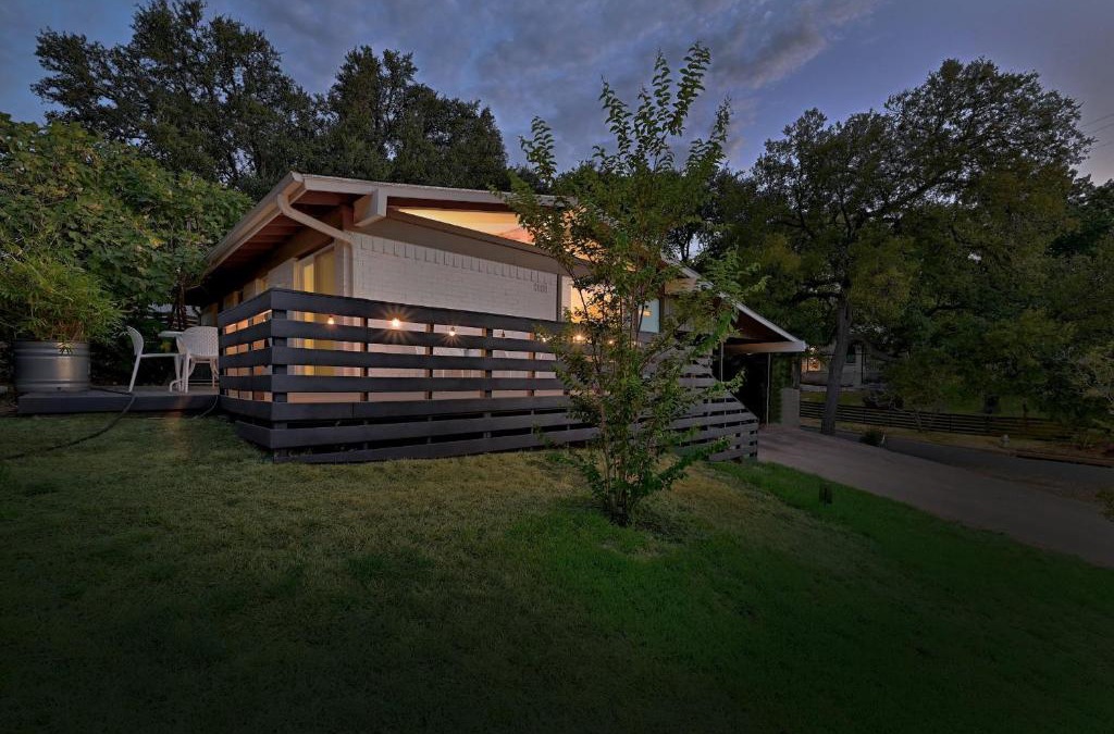 South River City House | Cheery Modern Retreat near SoCo & Downtown by Lodgewell