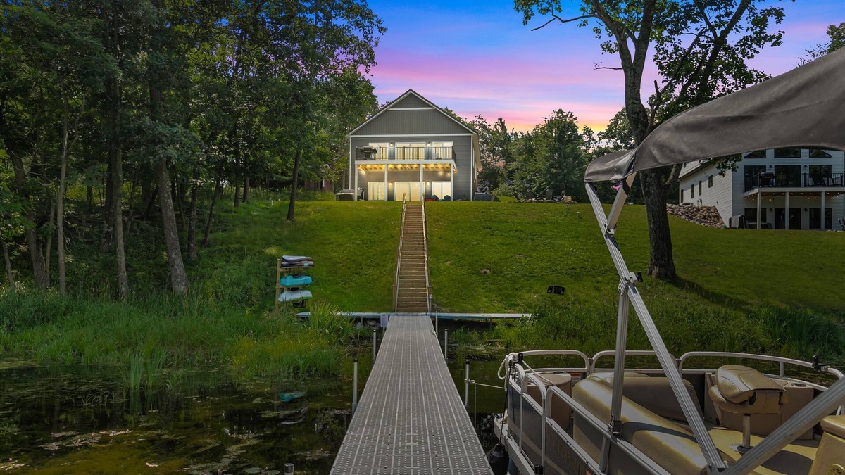 Pine River House | Chic Lakefront Escape- Hot Tub, Pier, & Kayaks