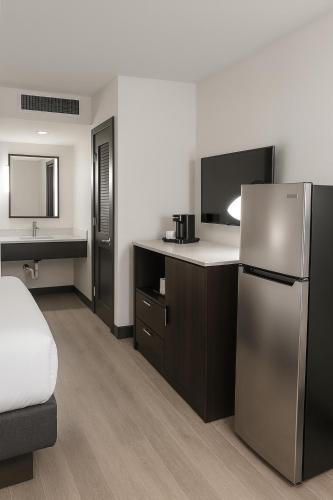 Wheatland Hotel | Citrus Extended Stay Suites OKC Airport