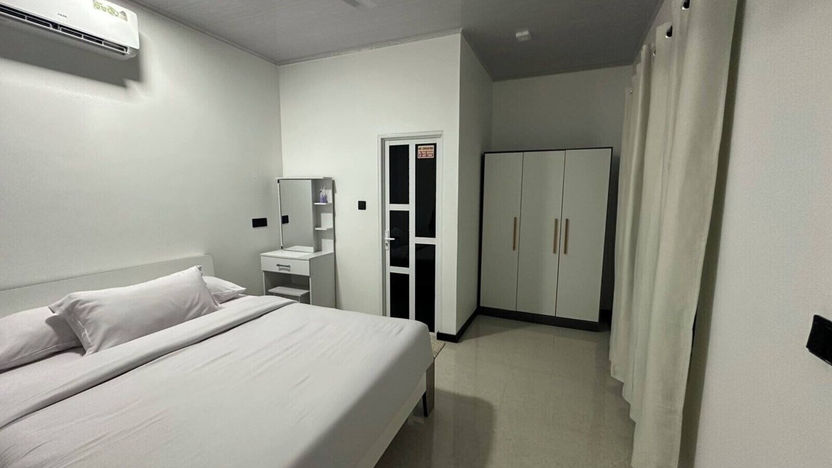 Thulusdhoo Island House | Close to the island's best spots, withncozy rooms and peaceful outdoor spaces.