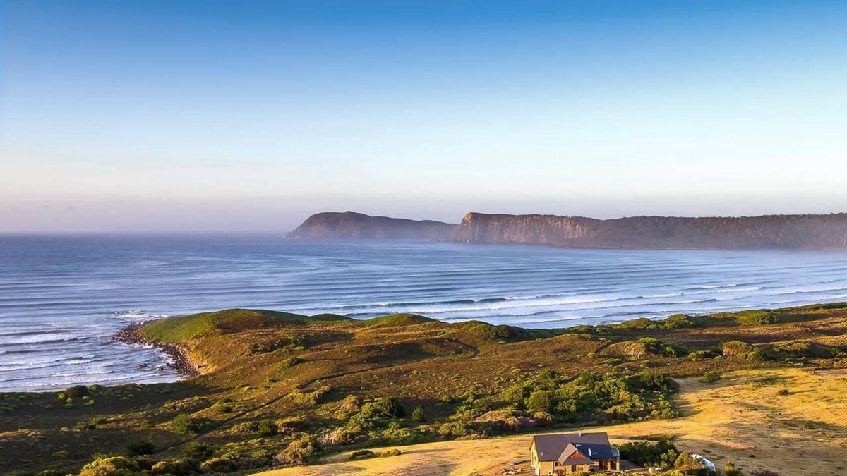 South Bruny House | Cloudy Bay Villa - Cloudy Bay Villa offers visitors a unique experience on secluded south Bruny Island. This spectacular two-story house on a gentle rise over Whalebone Point offers some of the best views in Tasmania.
