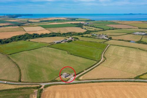 St Ishmaels House | Coastal Bungalow Near Marloes with Log Burner and Garden