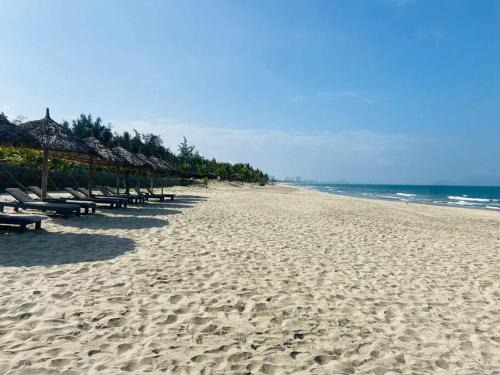 Dien Duong Apartment | Coastal Vibe - Resort 2BR apartment Pool & Beach