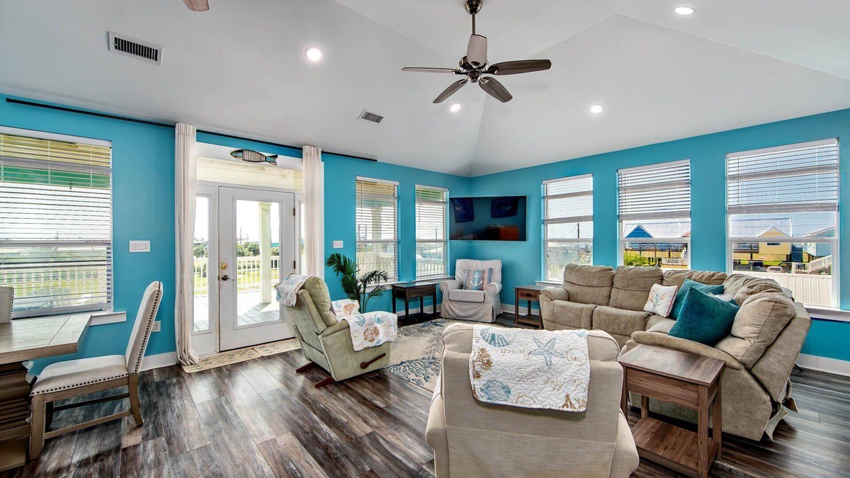 Grand Isle House | Coastal View: A charming 3-bedroom camp in Grand Isle, LA, across from the beach.