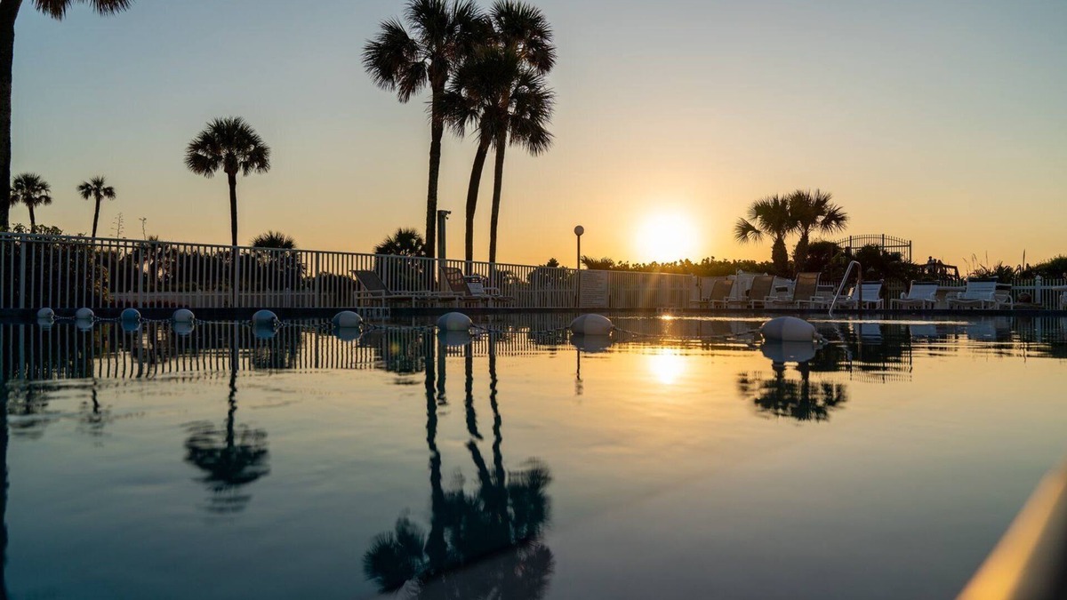 Port Canaveral Condo | Cocoa Beach Towers by Happy Palm Stays