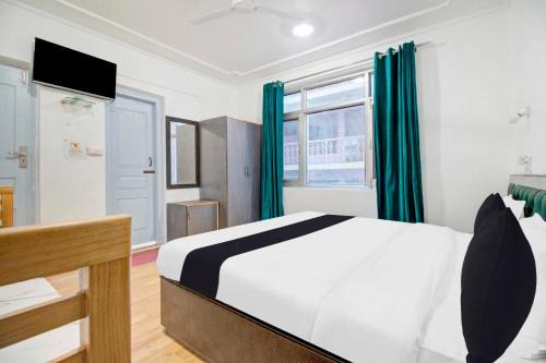 Rajbagh Hotel | Collection O Srinagar Jhelum Riverside