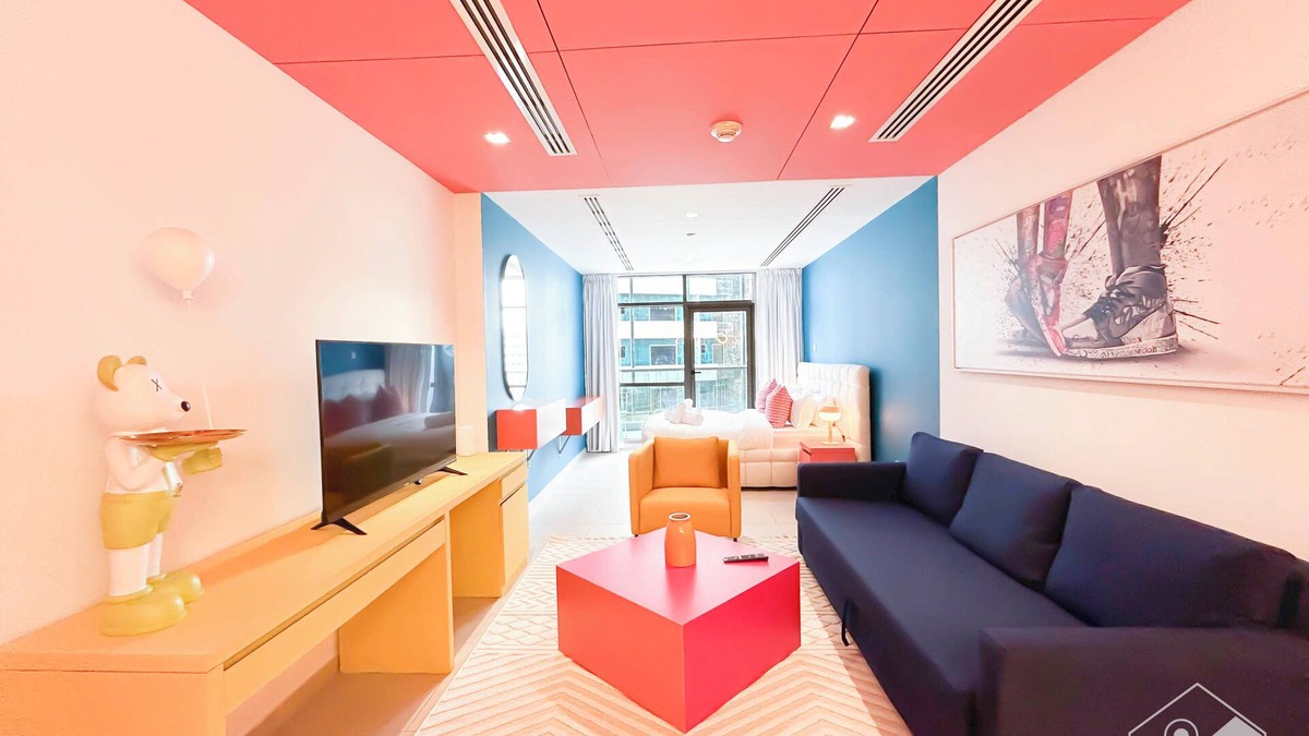 Dubai Sports City Apartment | Colorful Studio with Balcony & City Views