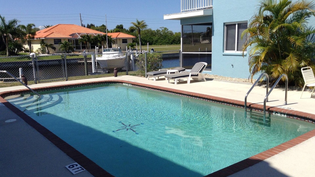 Punta Gorda Condo | Come Home to Paradise in Punta Gorda Isles. Waterfront Dock Heated Pool Quiet