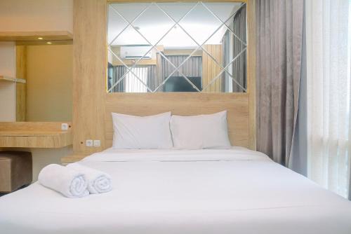 Pondokcina Apartment | Comfortable and Beautiful 1BR Apartment at Atlanta Residence By Travelio