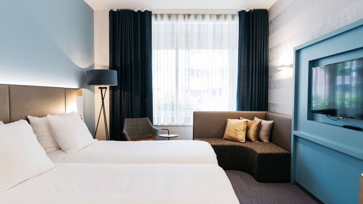 Weert Apartment | Comfortable Stay with Private Parking and Onsite Dining!