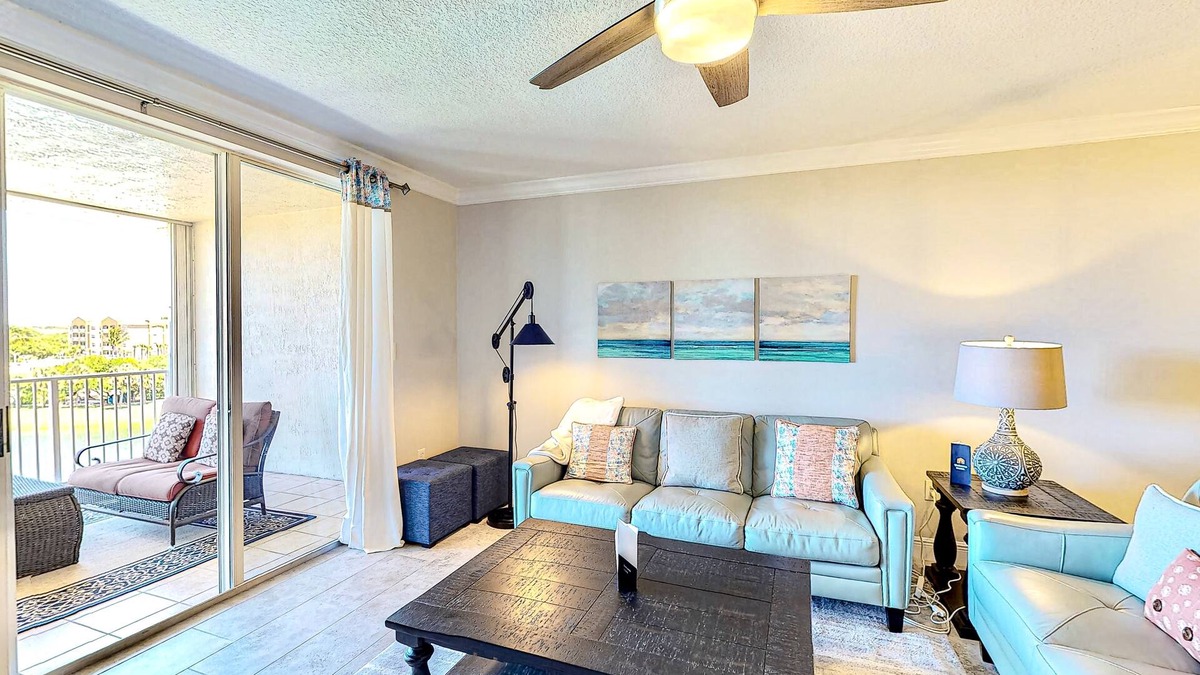 Port Canaveral Condo | Comfy condo in great location with pool, covered balcony, fast WiFi, W/D & AC