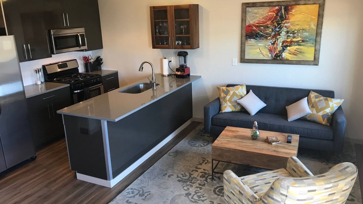 Steel Yards Apartment | Condo with deck facing the mountain, bike path and restaurant across the street, 5 min driving from down town