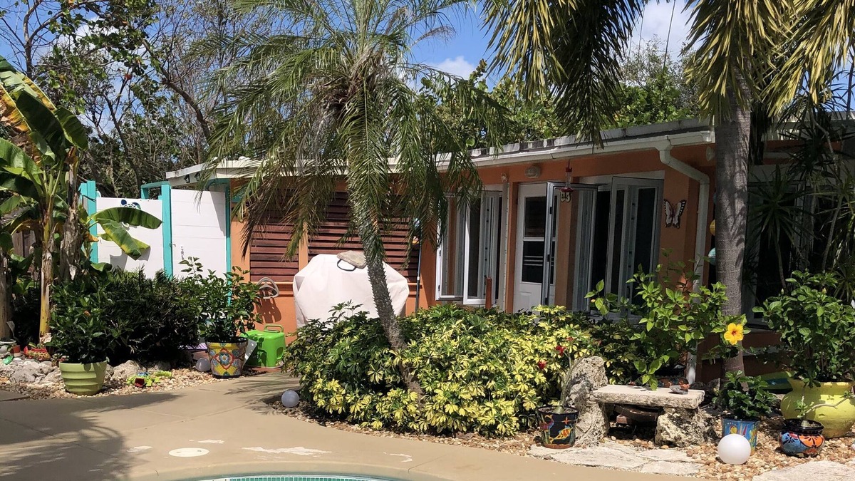 Port Pine Heights House | Coral Palms -Secluded tropical oasis pool and dock