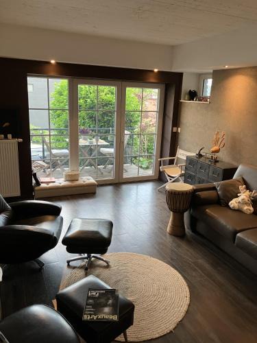Liege Apartment | Cosy Nest - Studio de luxe avec canapé-lit, terrasse et parking privé