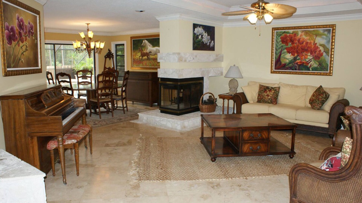 Hunt Club Bed & Breakfast | Country Garden Room with Water Garden feature and Queen Bed.