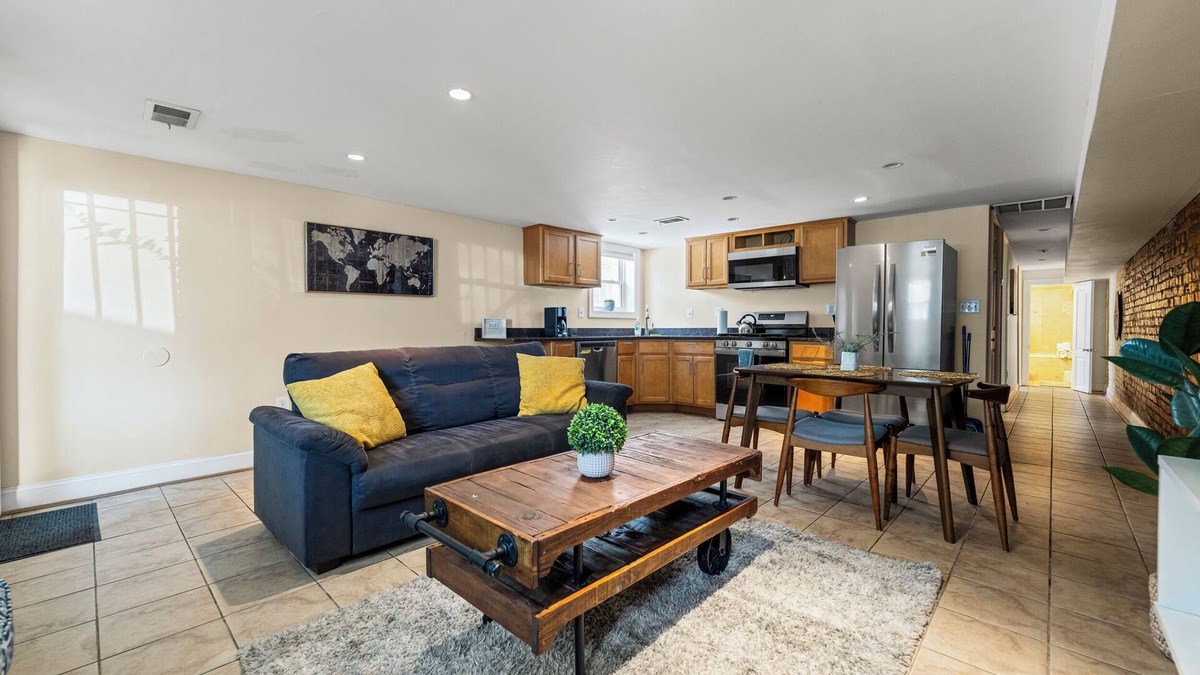 Columbia Heights House | Cozy 2 bedroom/1.5 bathroom English basement townhome. Spacious, safe, and family-friendly with open kitchen, dining area, and crib. Easy access to shops, restaurants, and DC attractions.