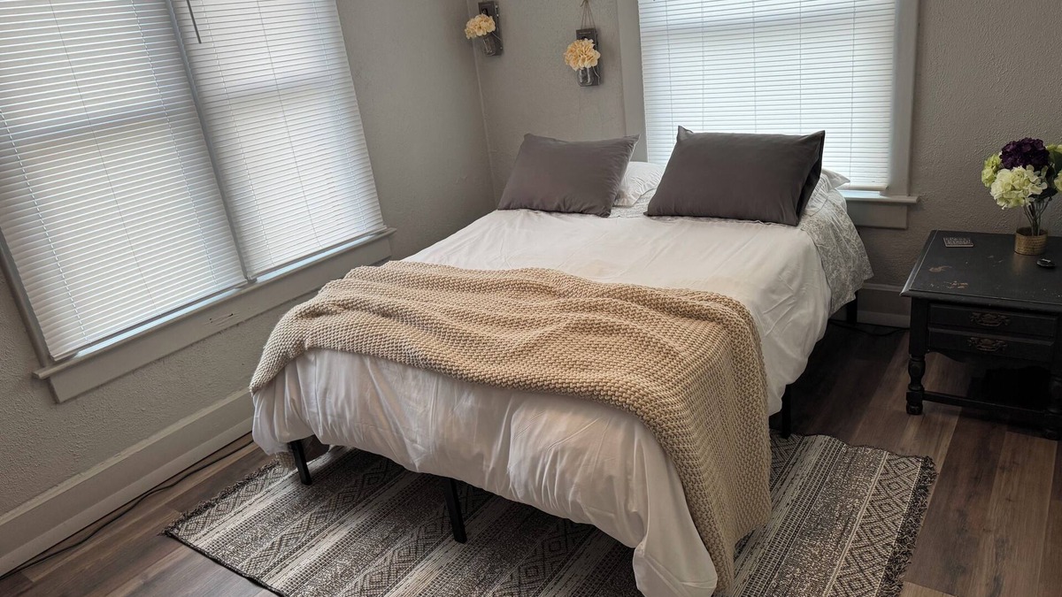 Plymouth Apartment | Cozy 2 Bedroom, with a Queen Bed in each, fire place, vanity, dresser, &two tv’s