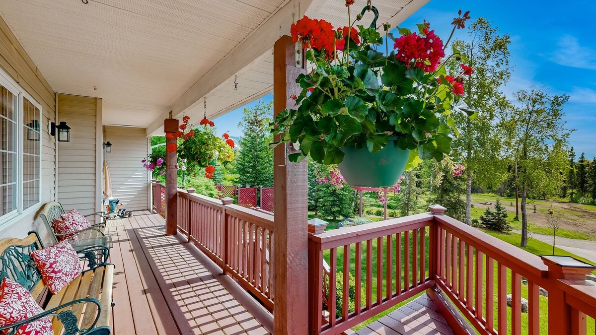 Mid-Hillside Apartment | Cozy apartment with large deck with views, hot tub & wood stove