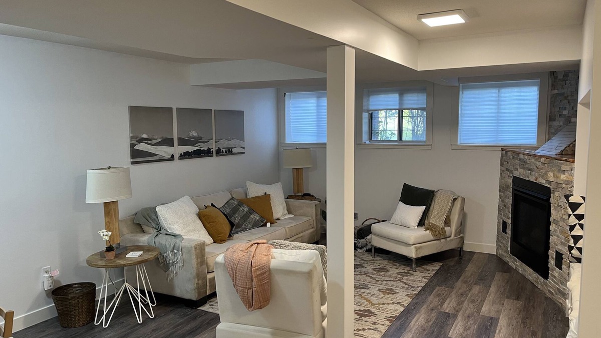Cedarbrae House | Cozy basement suite w/fireplace. Pet friendly!