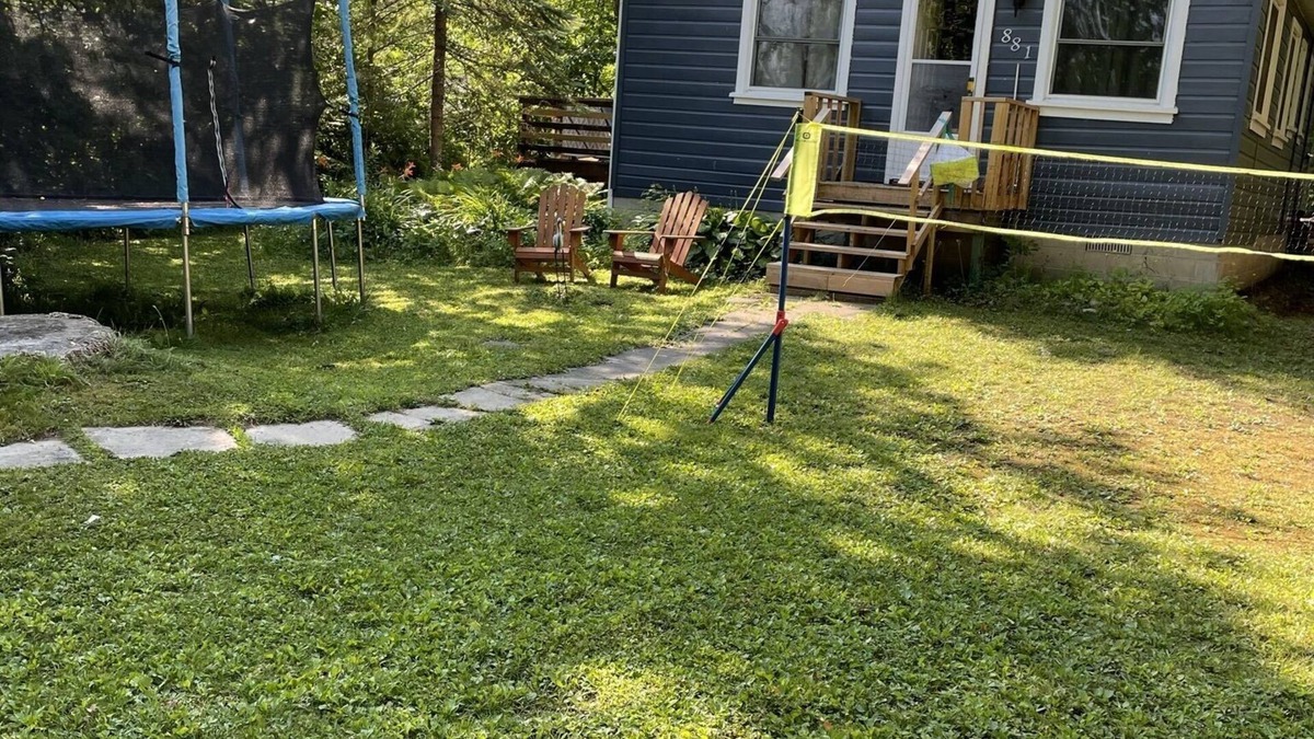 Alcona Cottage | Cozy cabin retreat steps to sandy, shallow beach