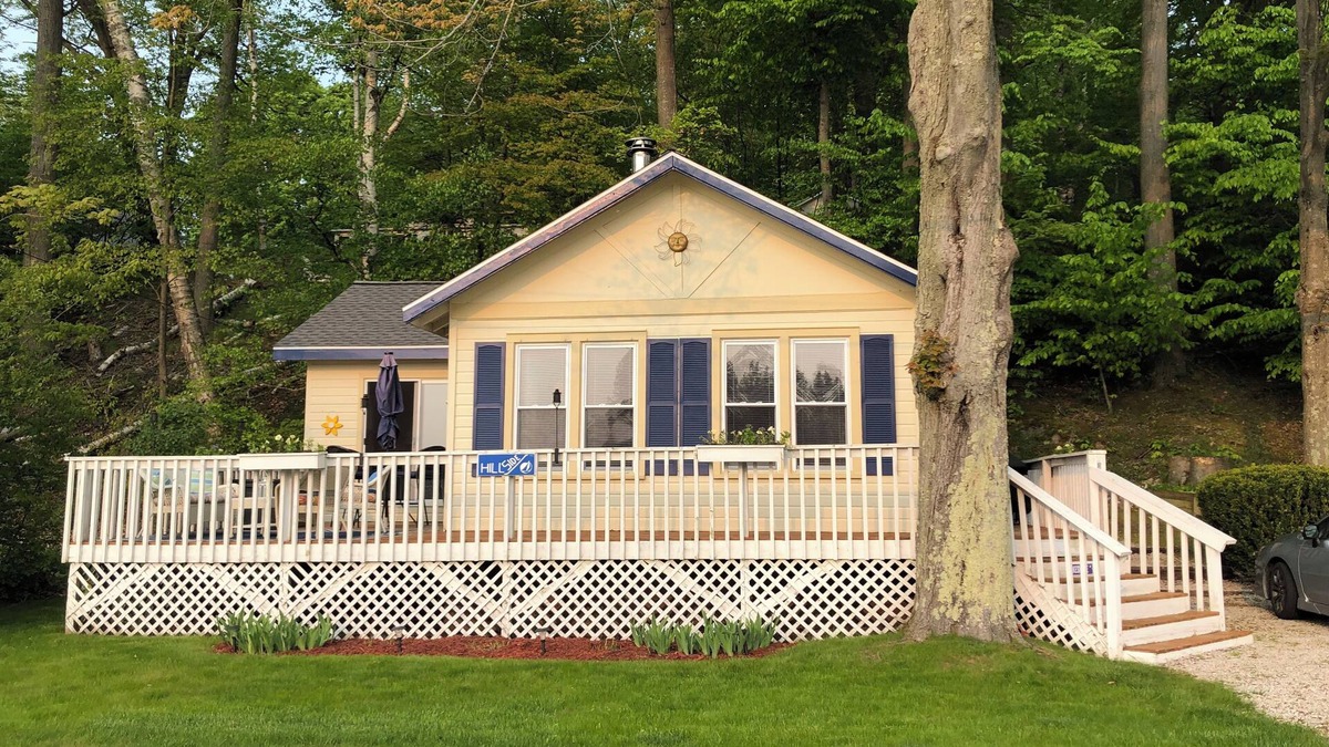 Ludington Cottage | Cozy cottage overlooking Hamlin Lake, a few minutes from downtown!