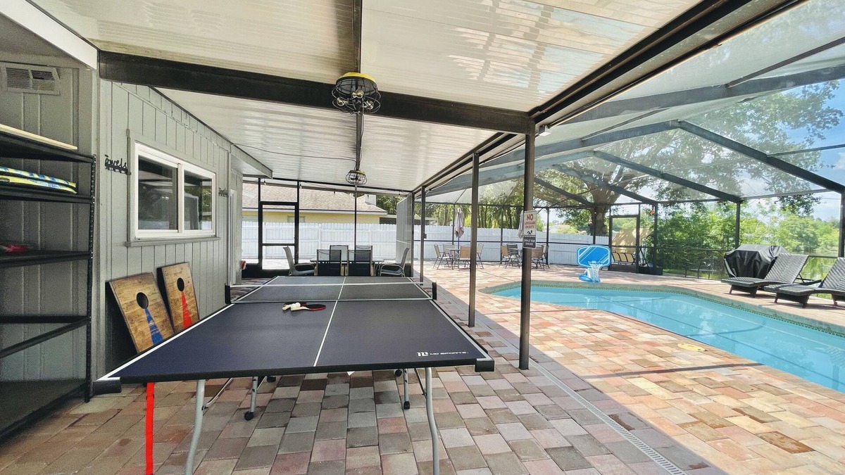 Citrus Park House | Cozy Lake House with Heated Salt Water Pool