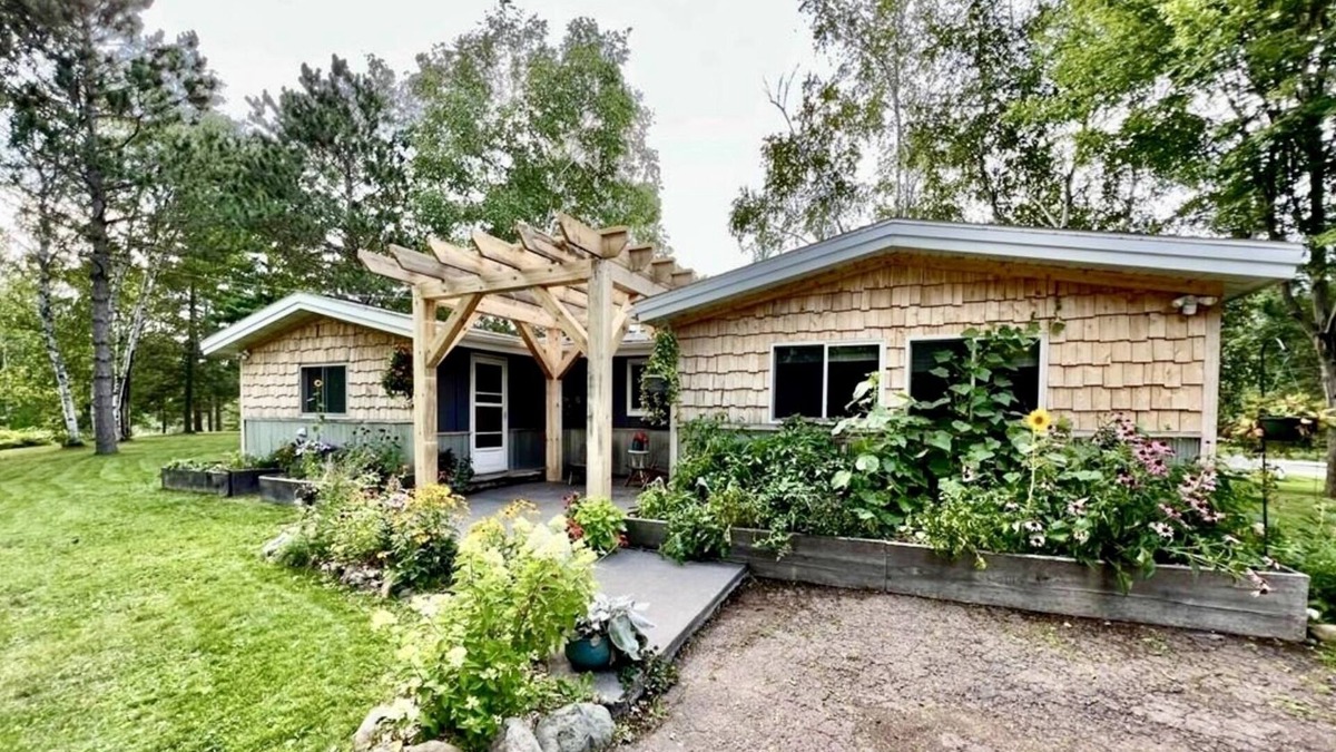 Hayward Cabin | Cozy Lakefront Cabin with Private Dock, Firepit, Grill, Kayaks and More!