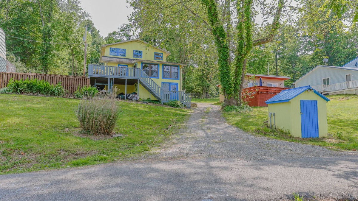 Hiwassee House | Cozy lakefront retreat with private dock, scenic views, updated interiors and serene outdoor seating