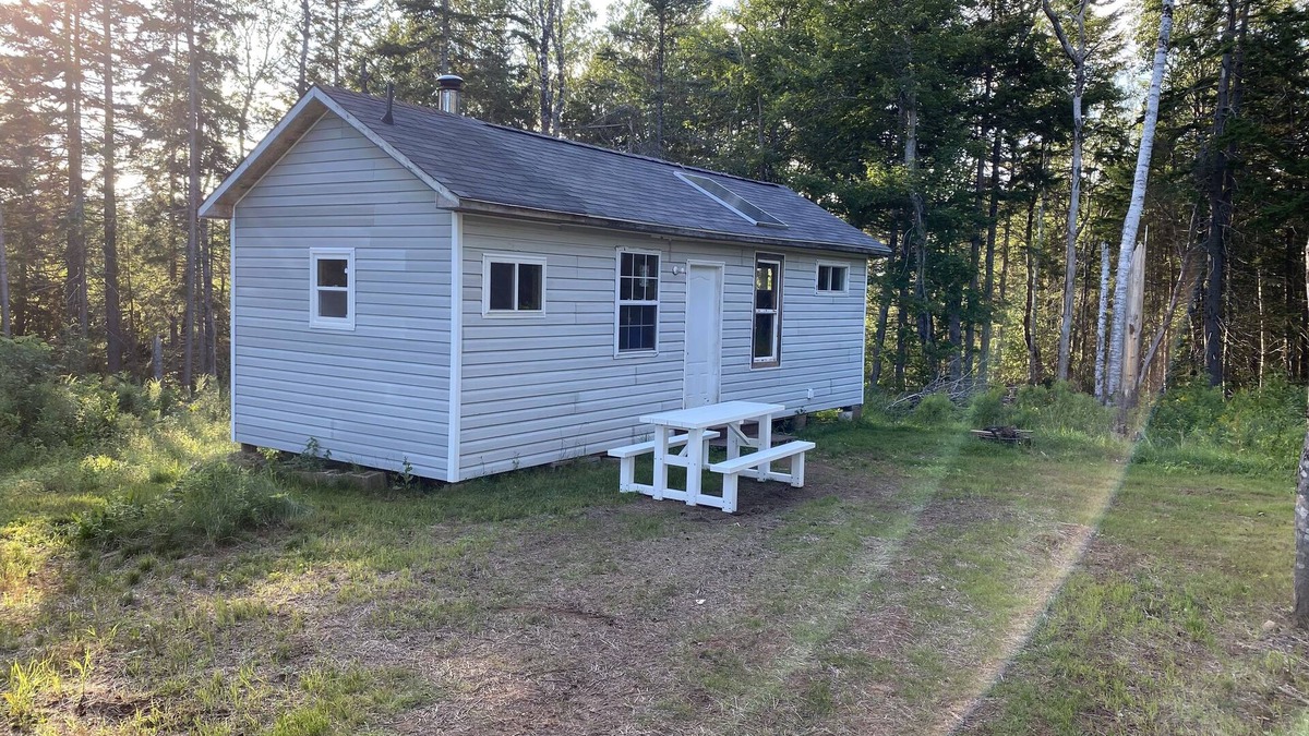 Amherst Cabin | Cozy off grid camp experience