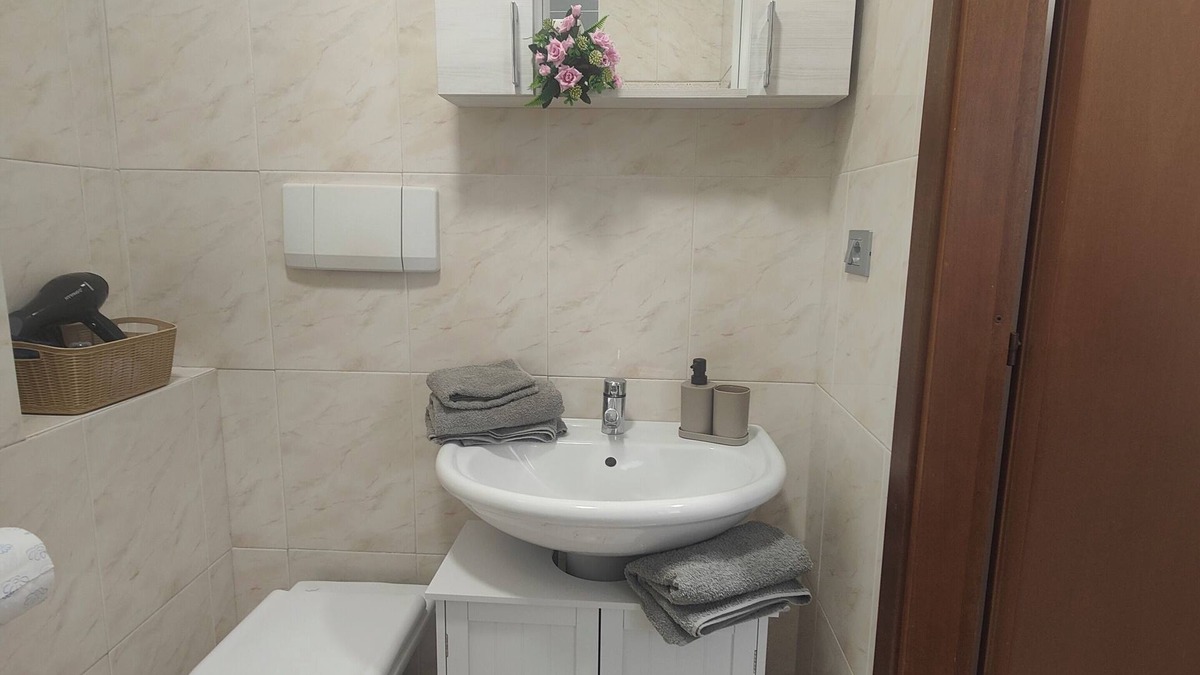 Cuneo Nuova House | Cozy one-bedroom apartment in the heart of Cuneo perfect for any business.