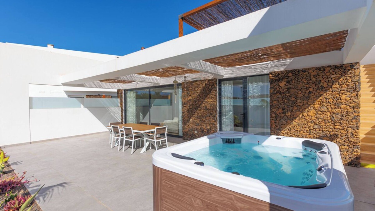 Corralejo Villa | Cozy retreat with outdoor hot tub, ideal for friends and families