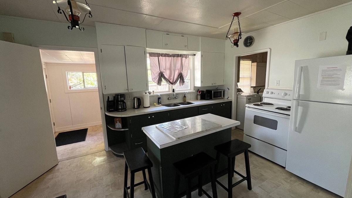 Duncan House | Cozy rustic 50's home located on a campground beside the Famous Cowichan River.