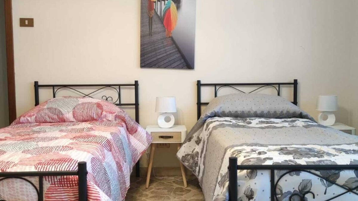Monte Po-Nesima-San Leone-Rapisardi Apartment | Cozy, spacious and bright apartment, vacation home, 3 independent rooms