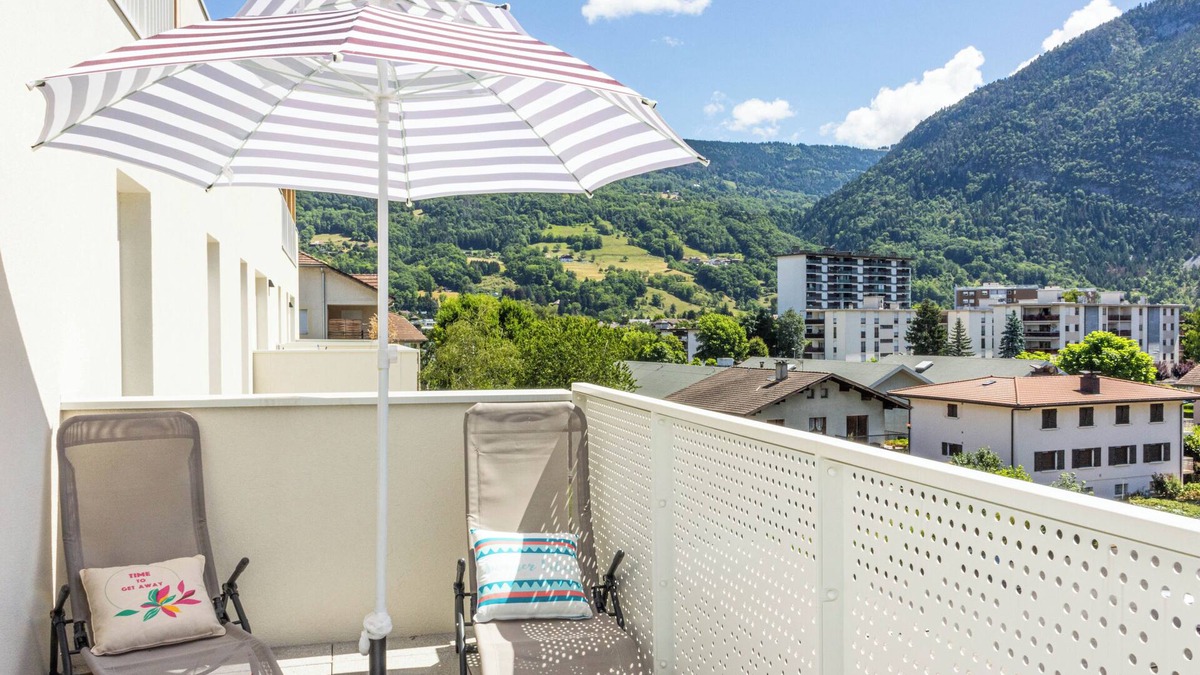 Cluses Condo | Cozy, Spacious condo with balcony and beautiful serene mountain views.