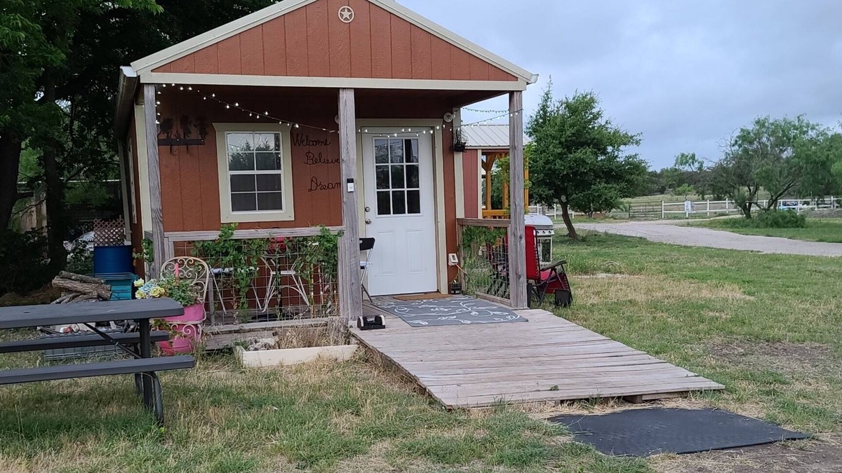 Kempner Cabin | Cozy Tiny Cabin with a small porch and firepit.