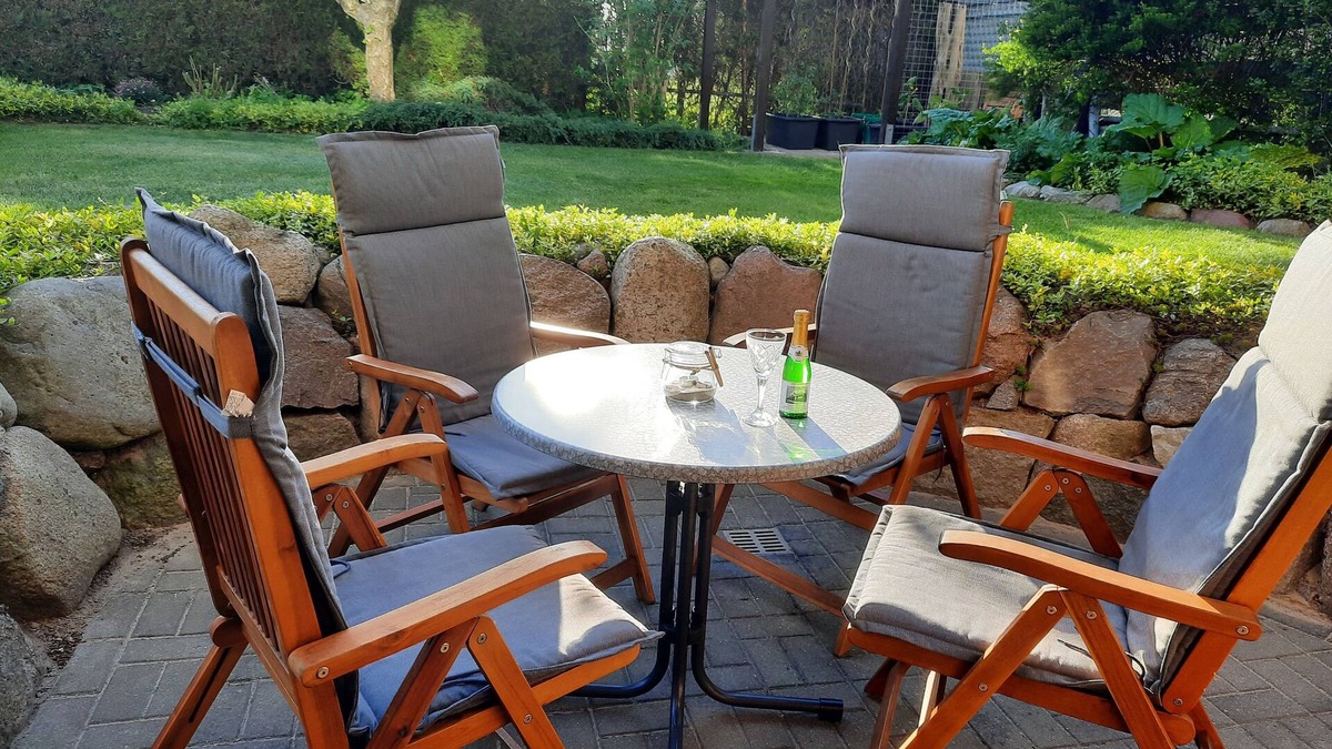 Ostseebad Kuhlungsborn Apartment | Cozy vacation apartment with natural stone terrace surrounded by greenery